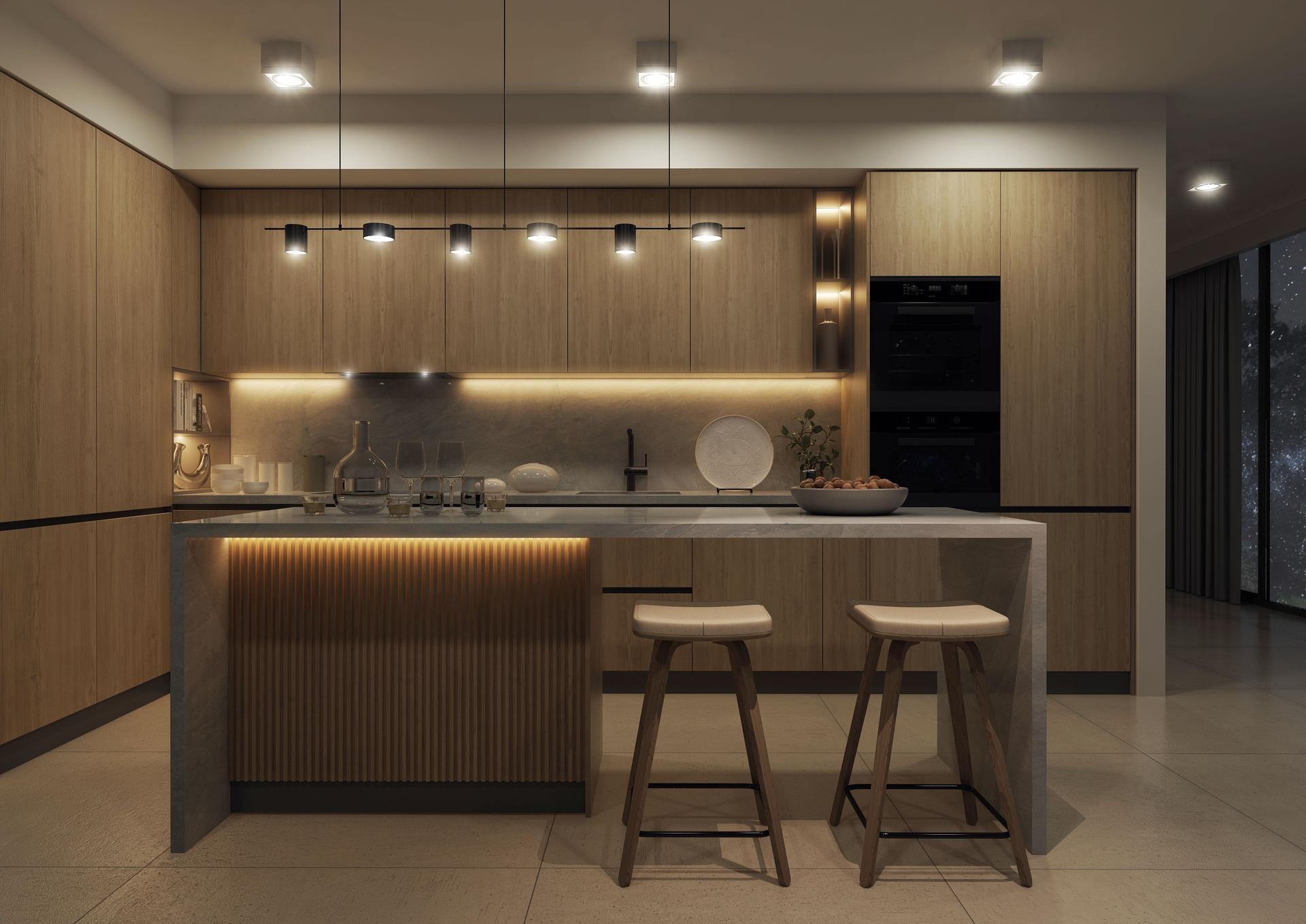 A modern spacious kitchen with a free-standing kitchen island.